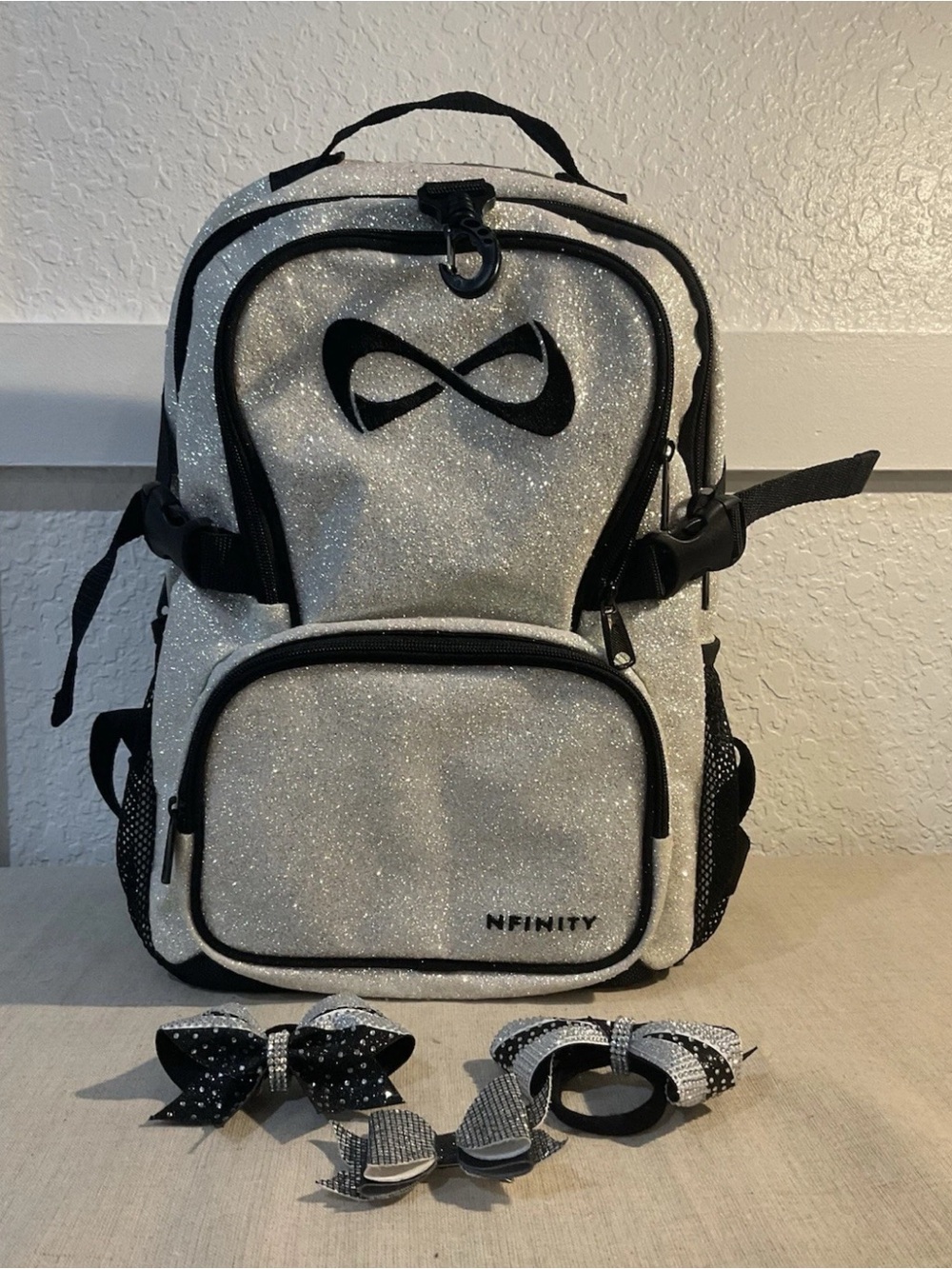NFINITY Silver Glitter Backpack with Black Trim and Bows